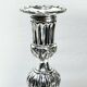 PAIR OF SILVERED BRONZE CANDLESTICKS