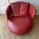 Curl armchair in red leather by Roche Bobois