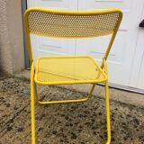 Perforated folding metal chair