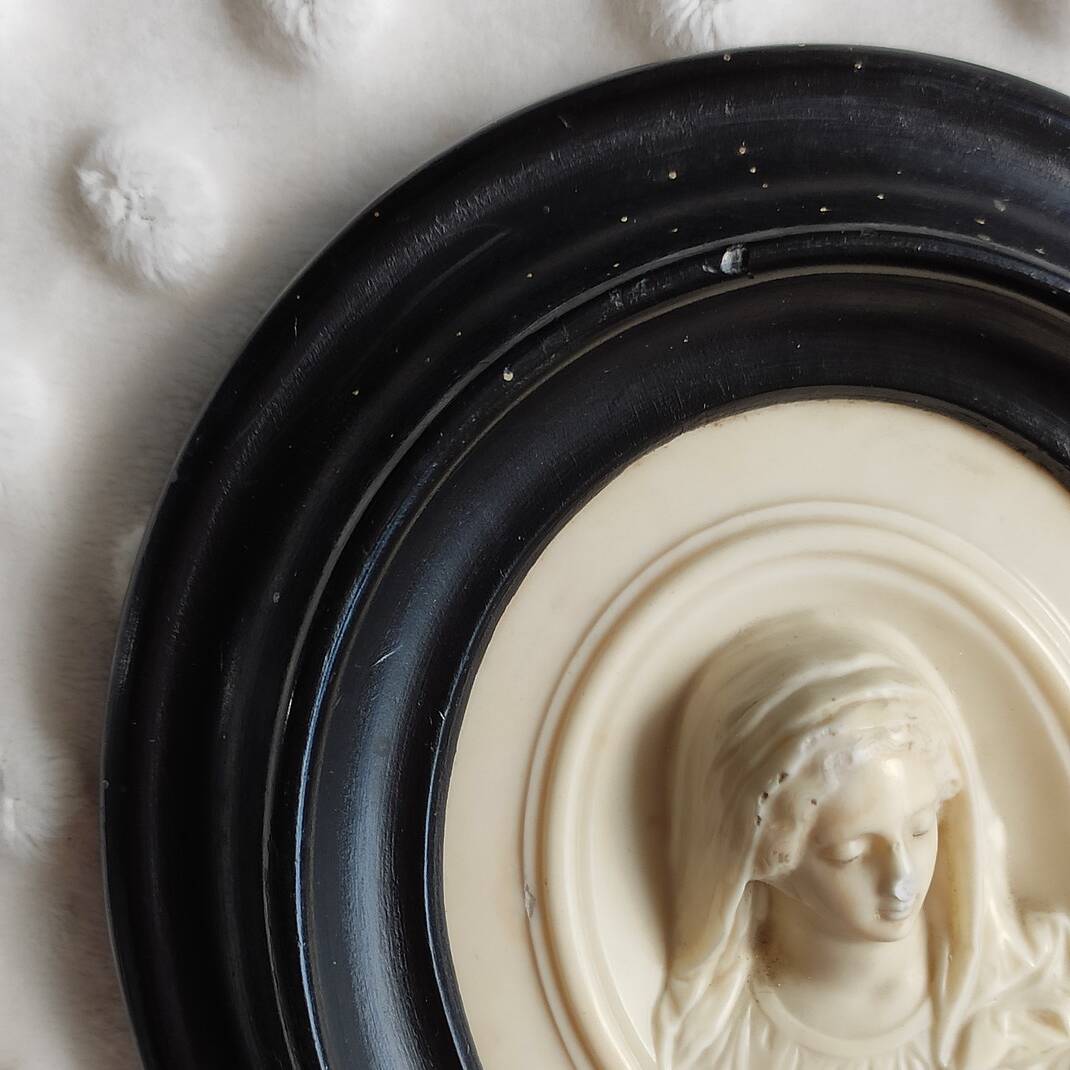 Limestone virgin medallion