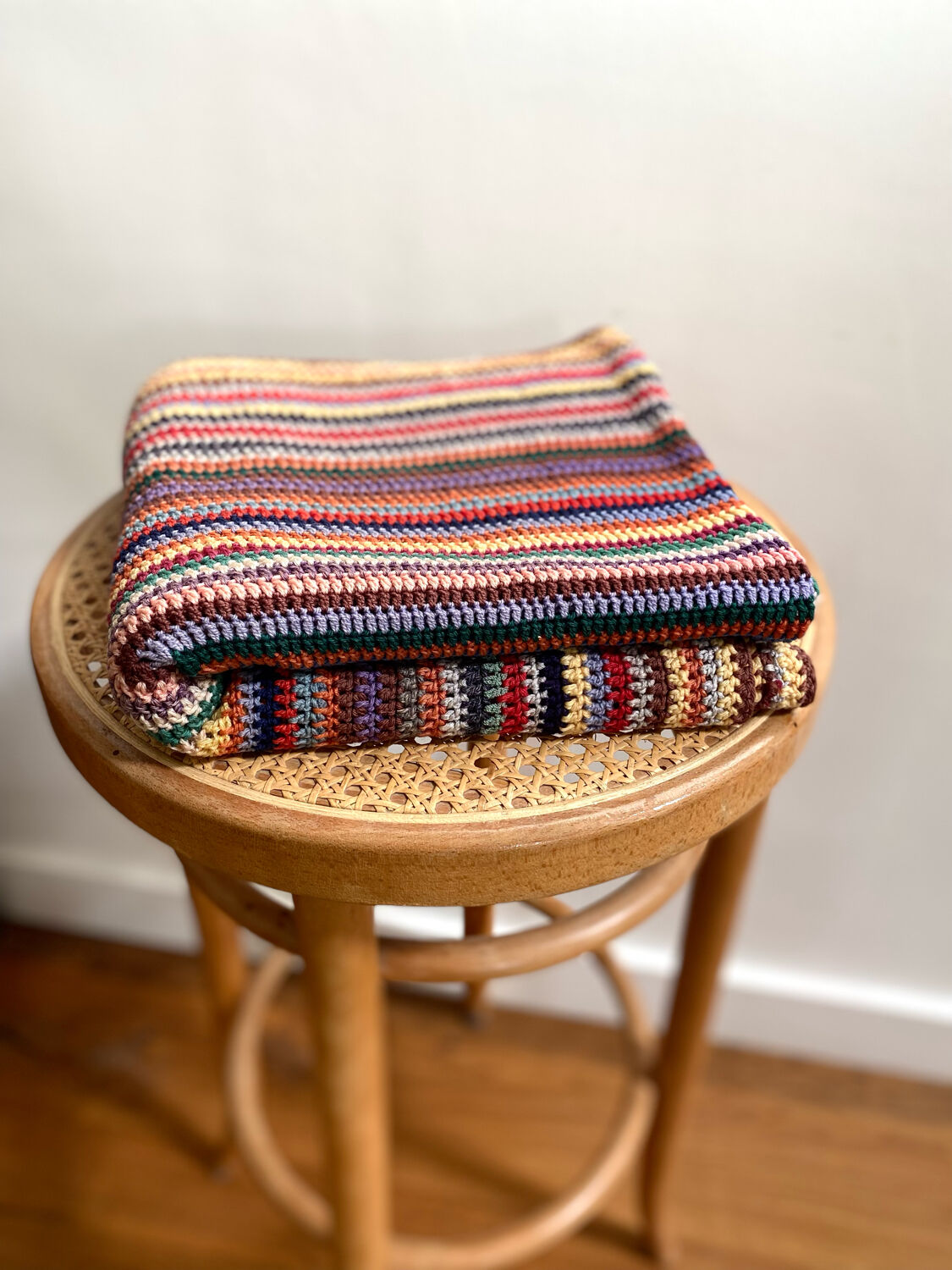 Hand crocheted wool blanket plaid
