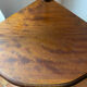 Corner shelf on a turned wooden stand