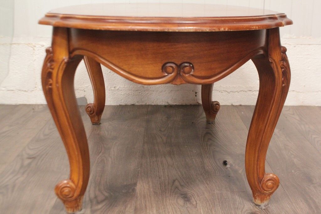 Louis XV style oval coffee table with glass top