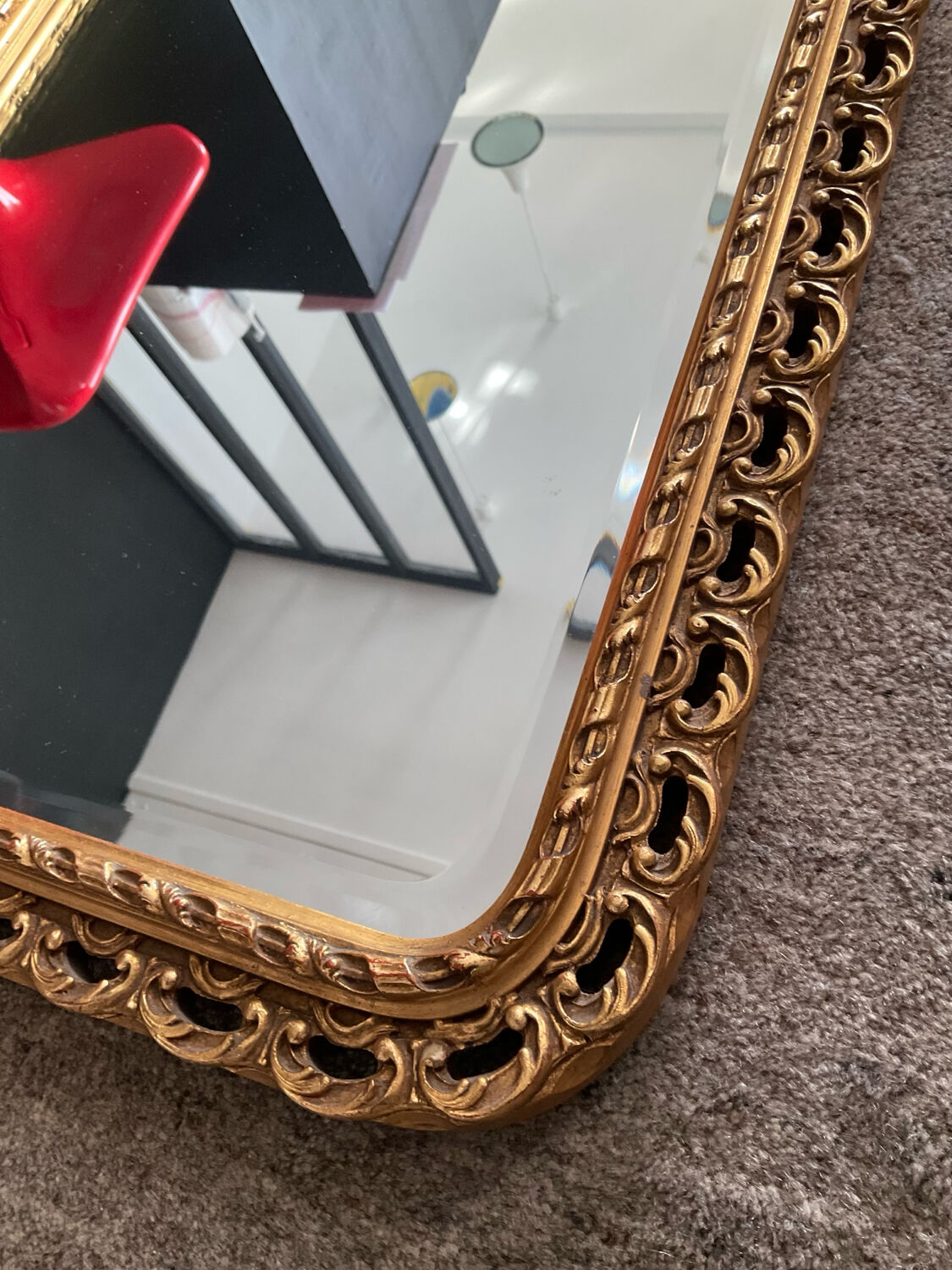 Ancien miroir en bois doré et verre biseauté