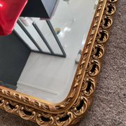 Ancien miroir en bois doré et verre biseauté