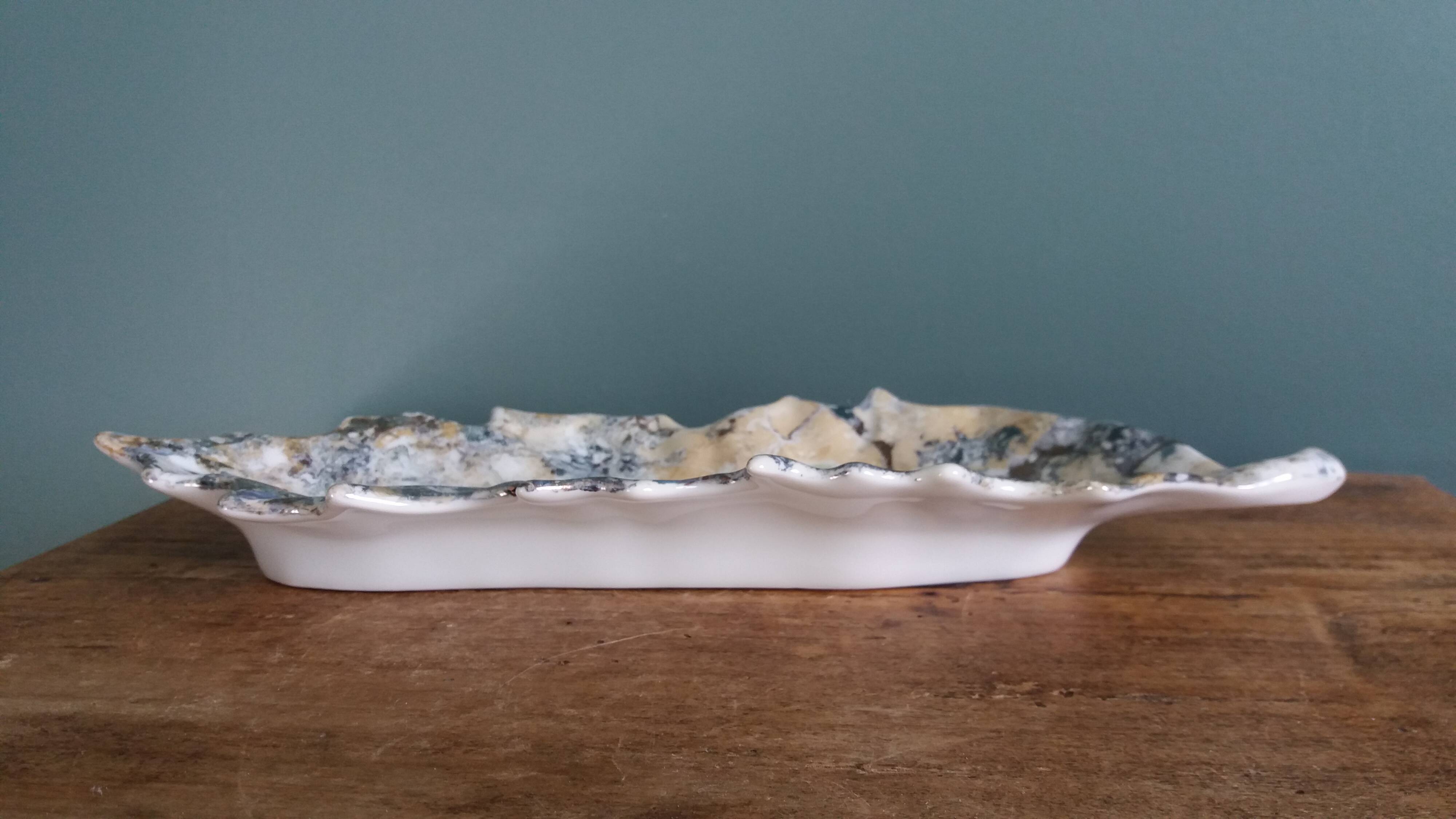 Iridescent enamelled leaf catchall, signed Gfredy.