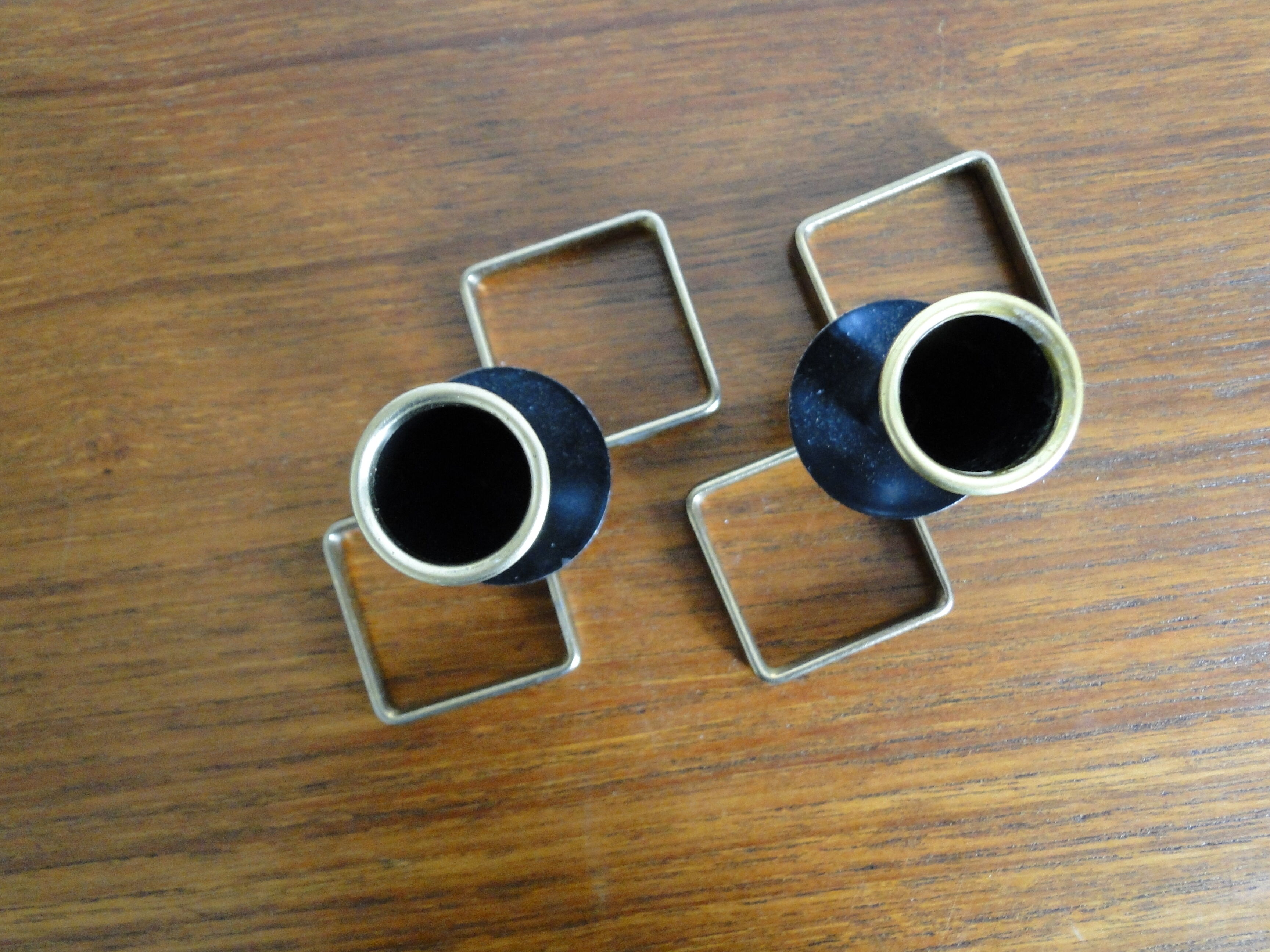 Pair of vintage candle holders in black metal and brass Sweden 1960