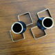 Pair of vintage candle holders in black metal and brass Sweden 1960