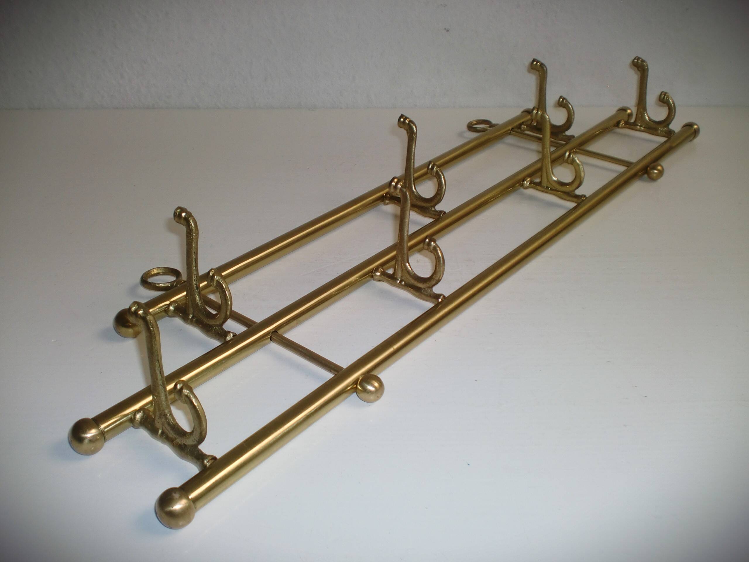 1 of 2 brass coat racks with 7 foldable hooks 1940s art-deco