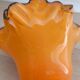 Pair of orange glass tulips with black trim, vintage 70s.