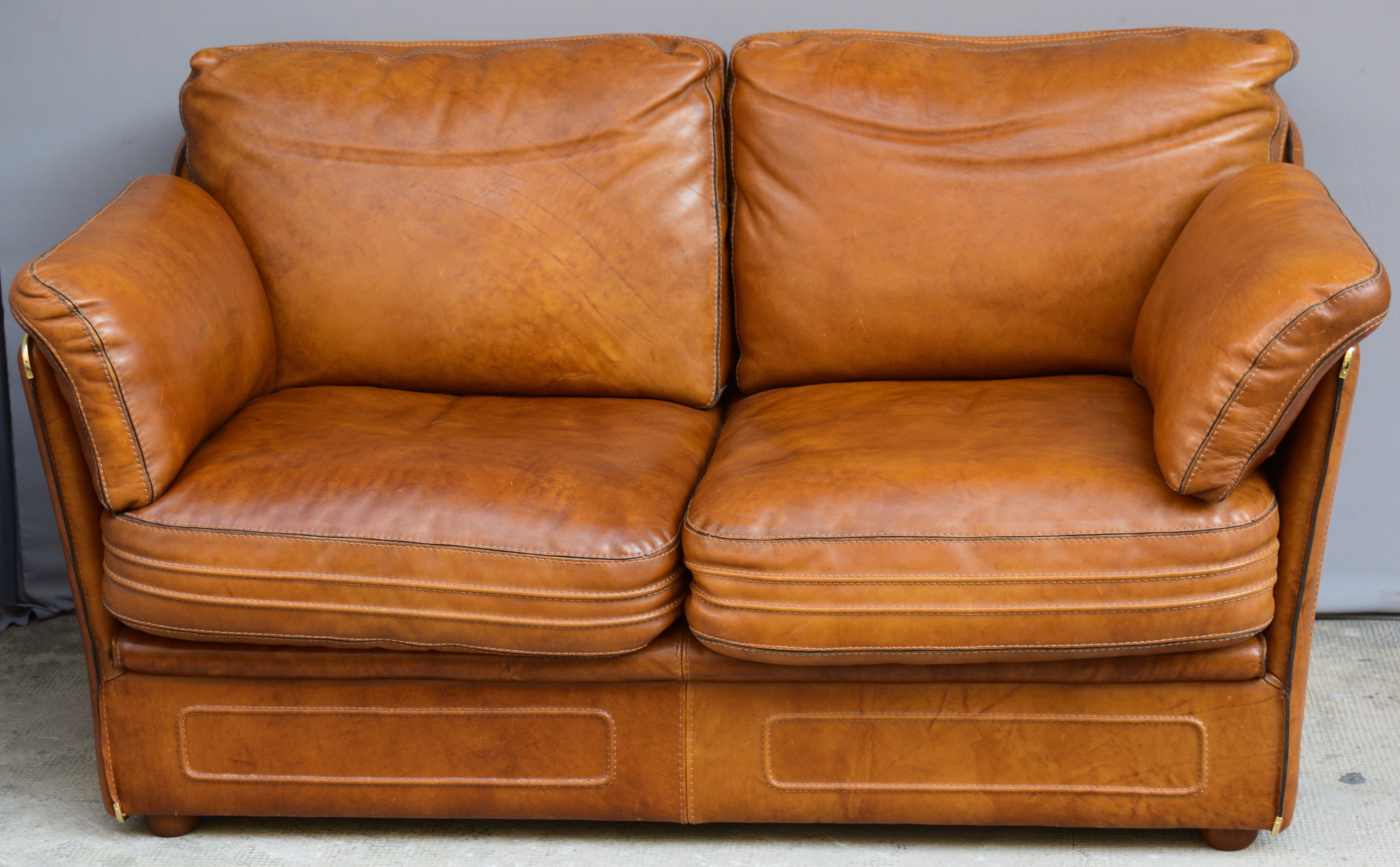 Vintage two-seater leather sofa