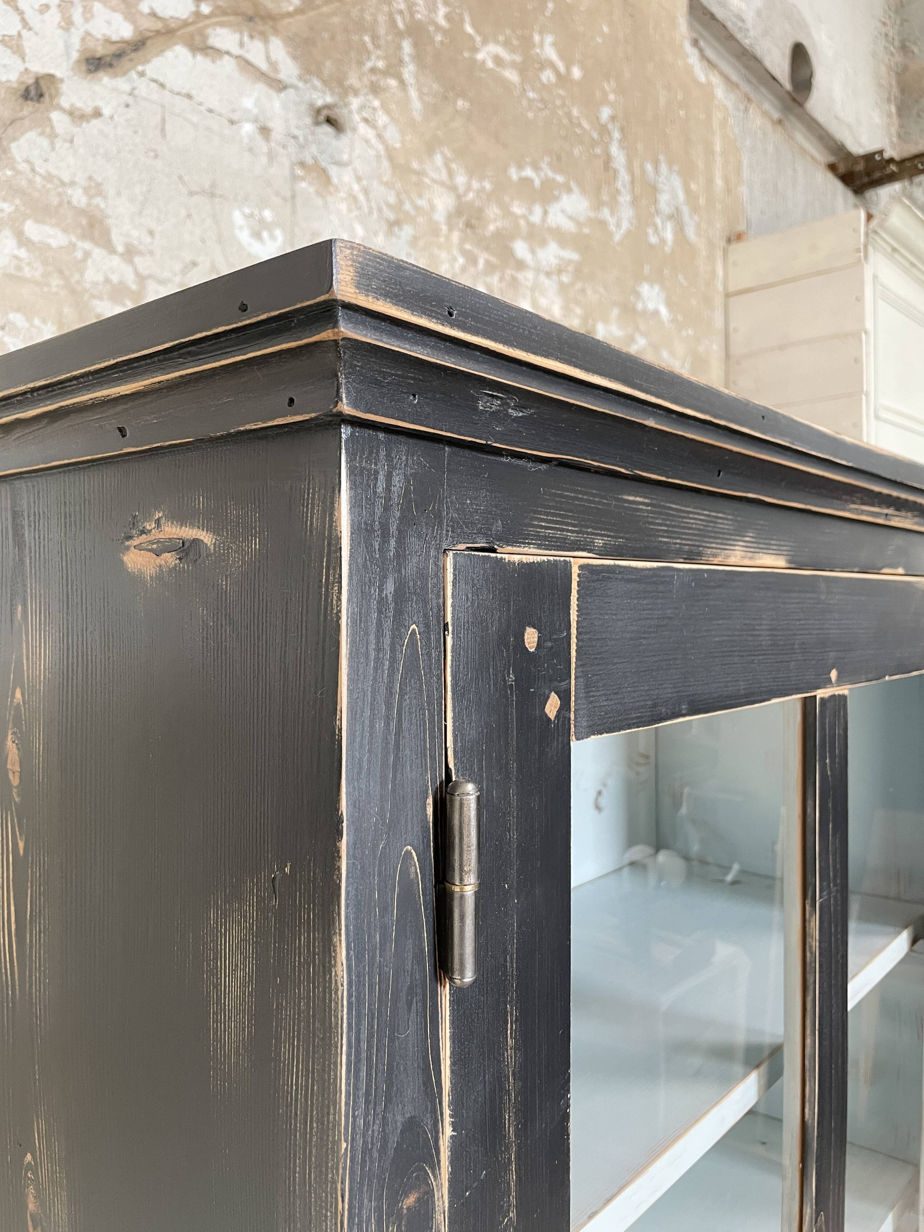 Display cabinet in patinated wood