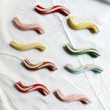 Set of 9 enamelled ceramic knife holders