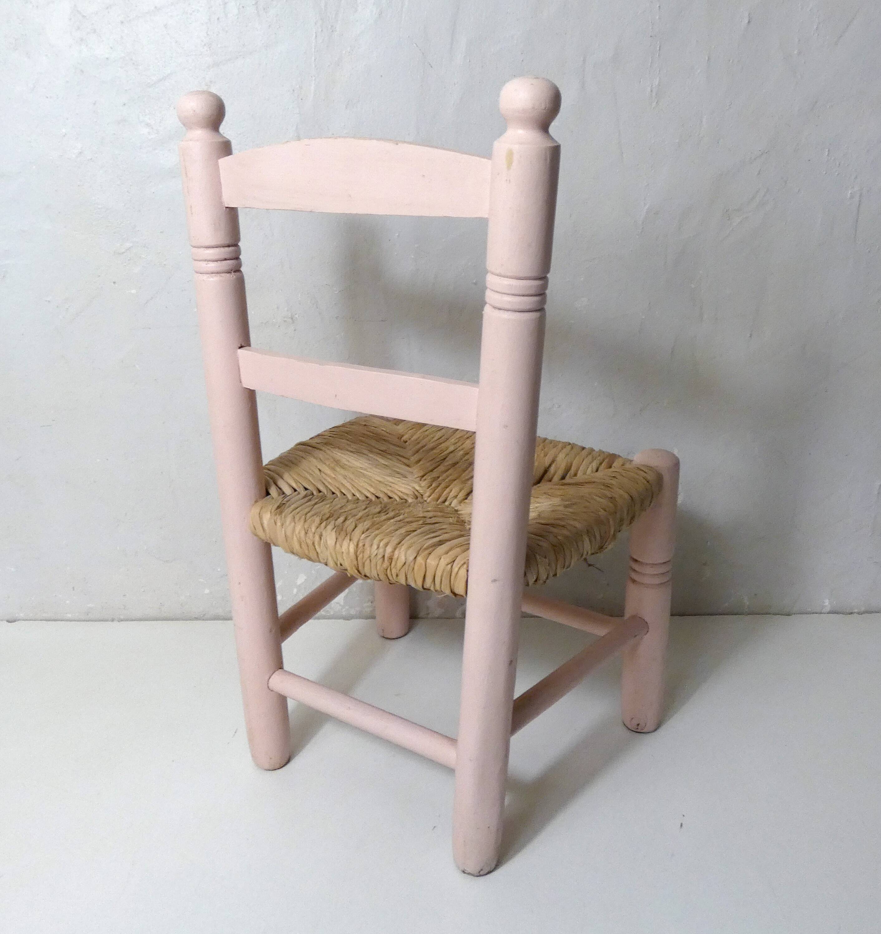 Old wooden straw chair for children