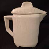 Old covered jug, vintage, geometric frieze and flowers with a border.