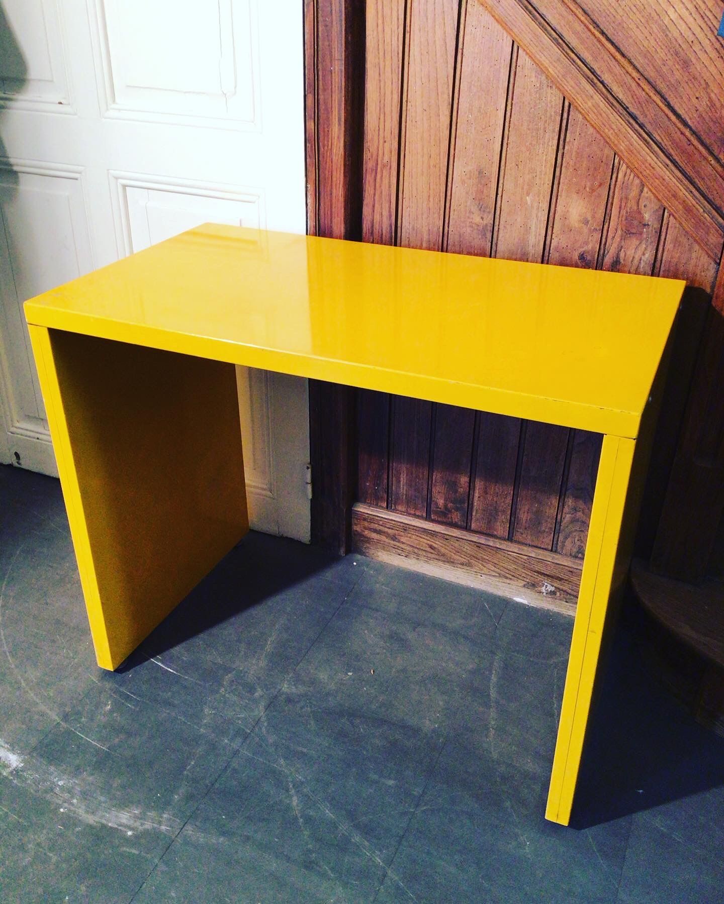 Small yellow metal desk