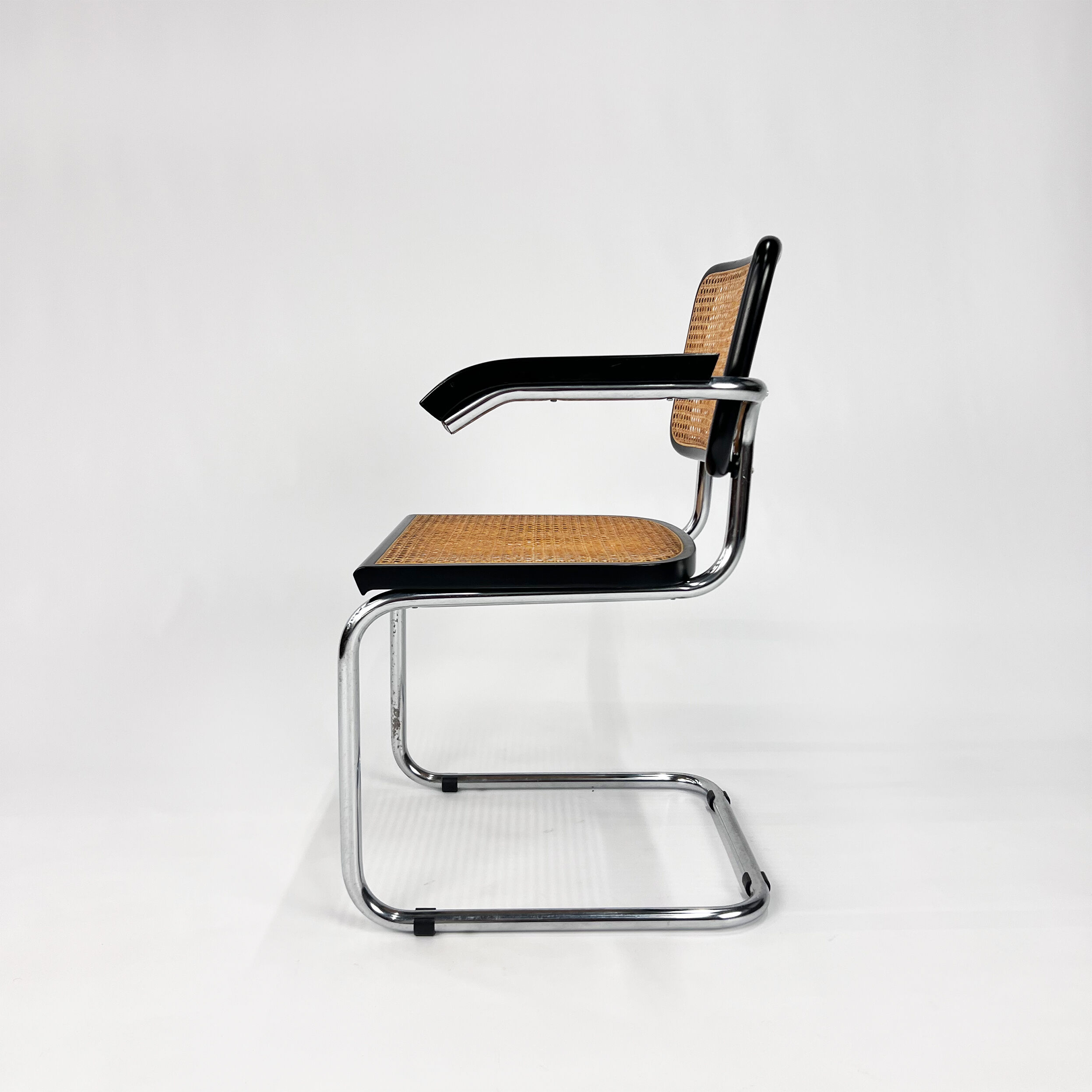 Tubular frame and cane cantilever dining chair, Italy, 1970s