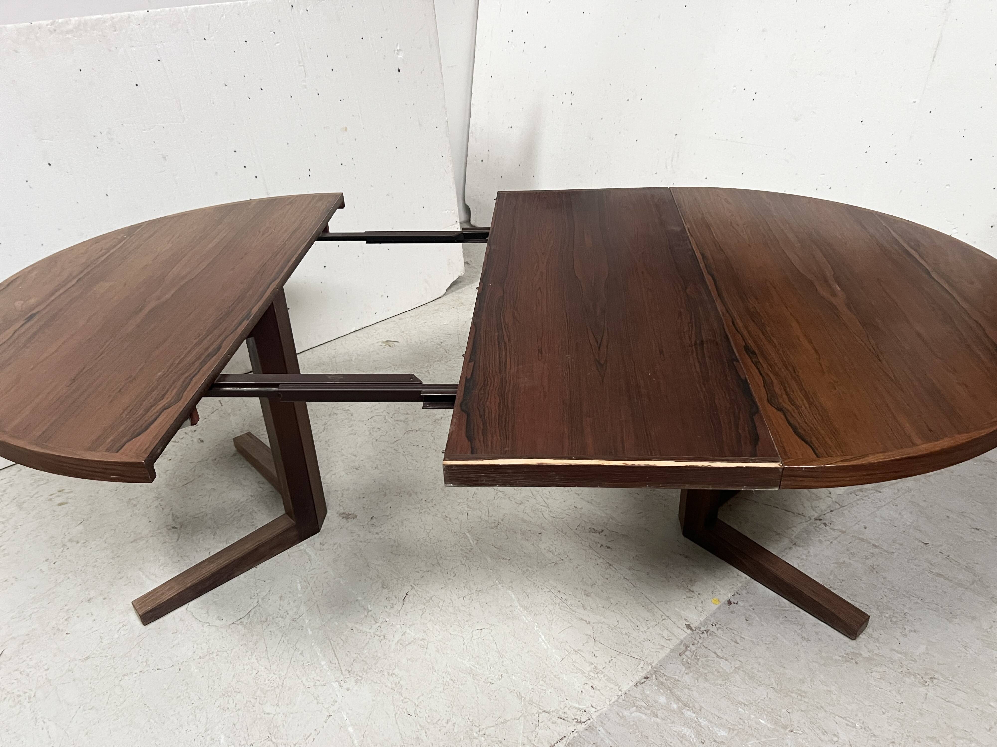 Scandinavian dining table in rosewood veneer "by John MORTENSEN"