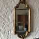 Old gilded wood mirror