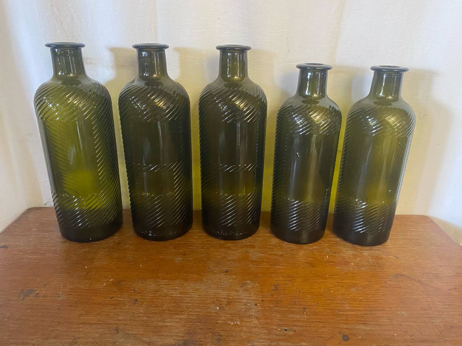 Set of 5 antique carapelli bottles, smoked and ribbed vintage glass