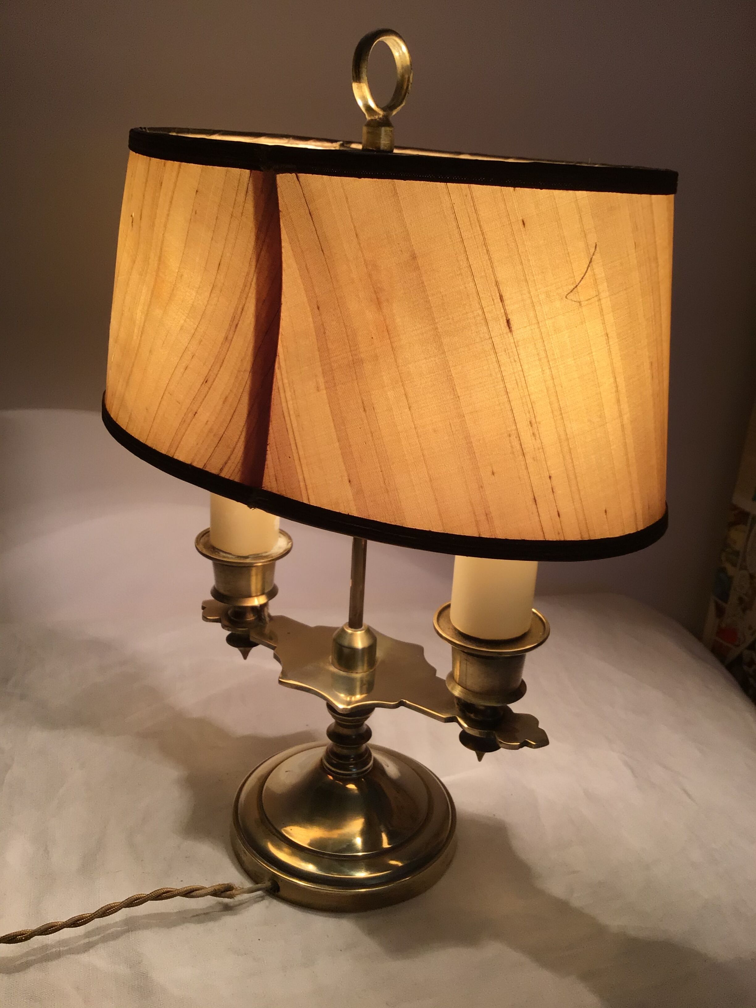Old golden brass hot water bottle lamp with 2 arms of light