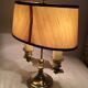 Old golden brass hot water bottle lamp with 2 arms of light