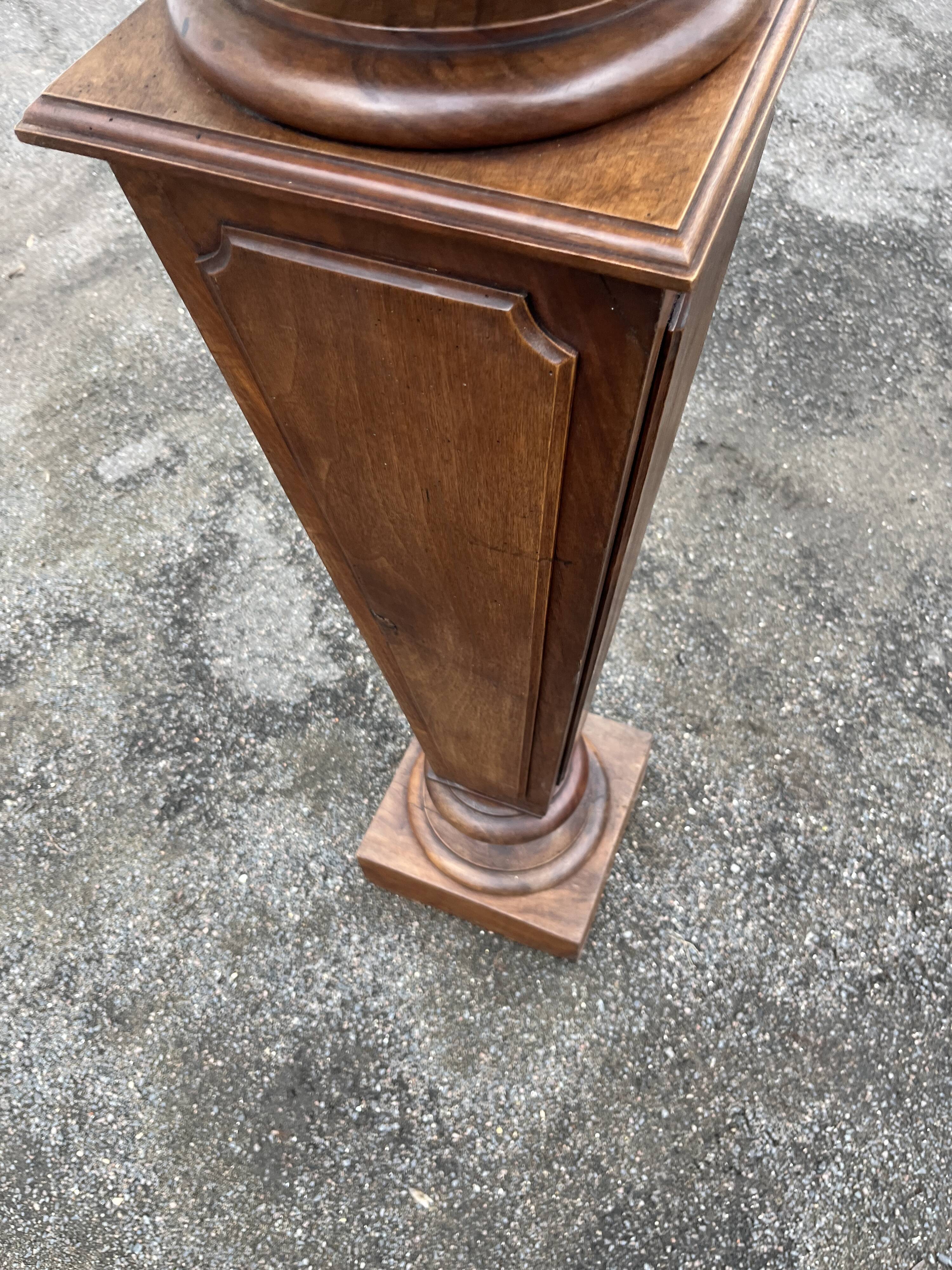 Large wooden and marble column/sheath