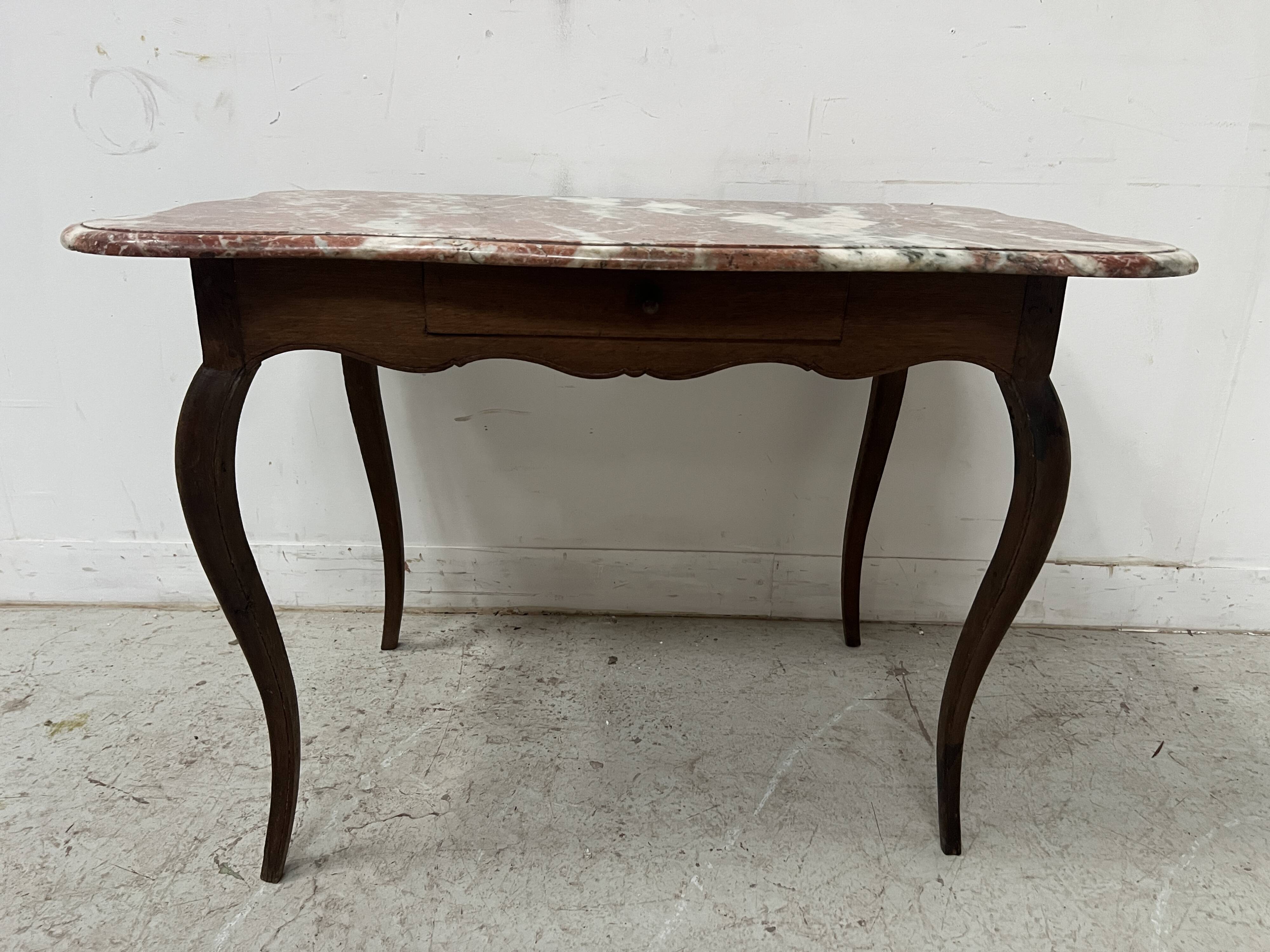 Louis XV mid-table in oak and marble, 18th century.