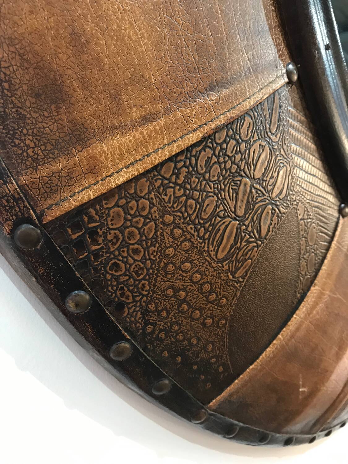 Large round leather mirror