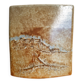 Large handcrafted ceramic vase in an oblong shape.