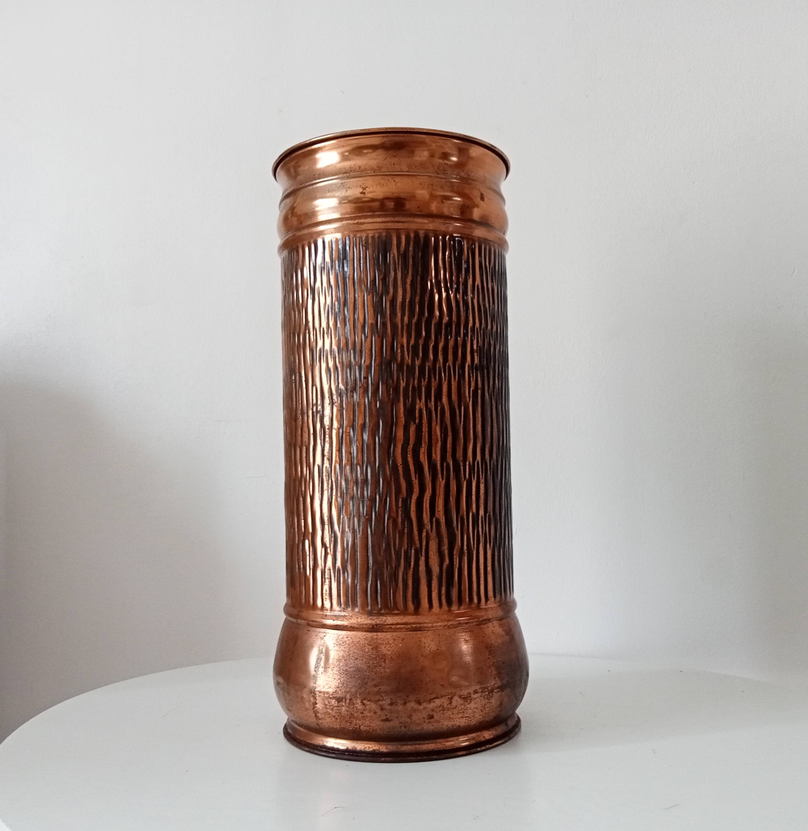 Vintage brutalist umbrella stand in hammered copper with a wood effect.