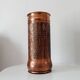 Vintage brutalist umbrella stand in hammered copper with a wood effect.
