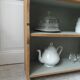 Small vintage bookcase, 5 fixed shelves, interior sublimated in verdigris, waxed finish.