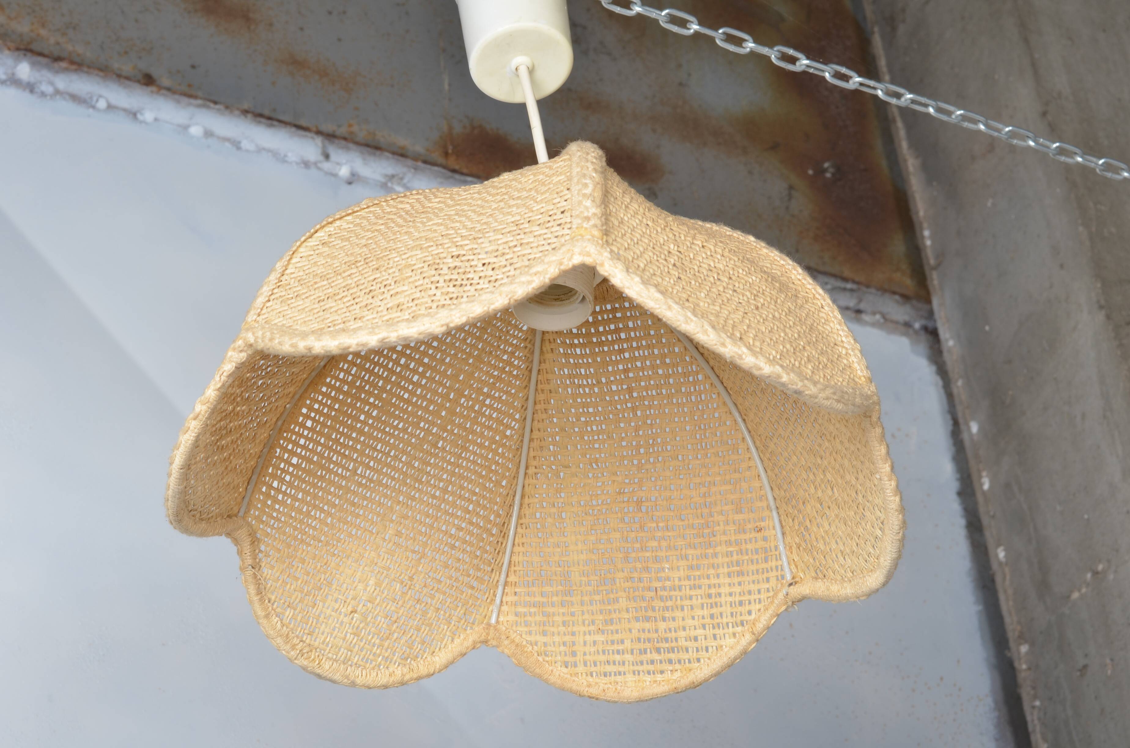 Braided flower pendant