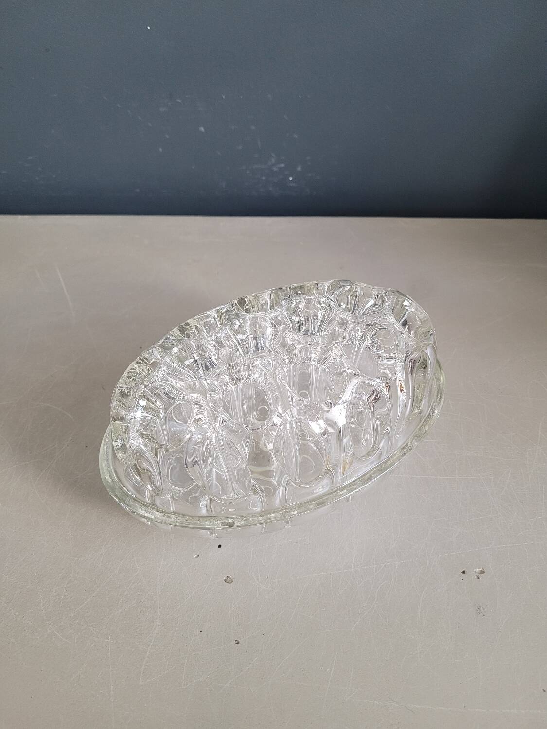 Large molded glass flower holder