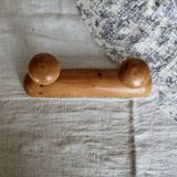 Antique wooden coat rack with two round hooks