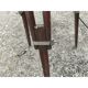Spotlight on wooden and chrome tripod.