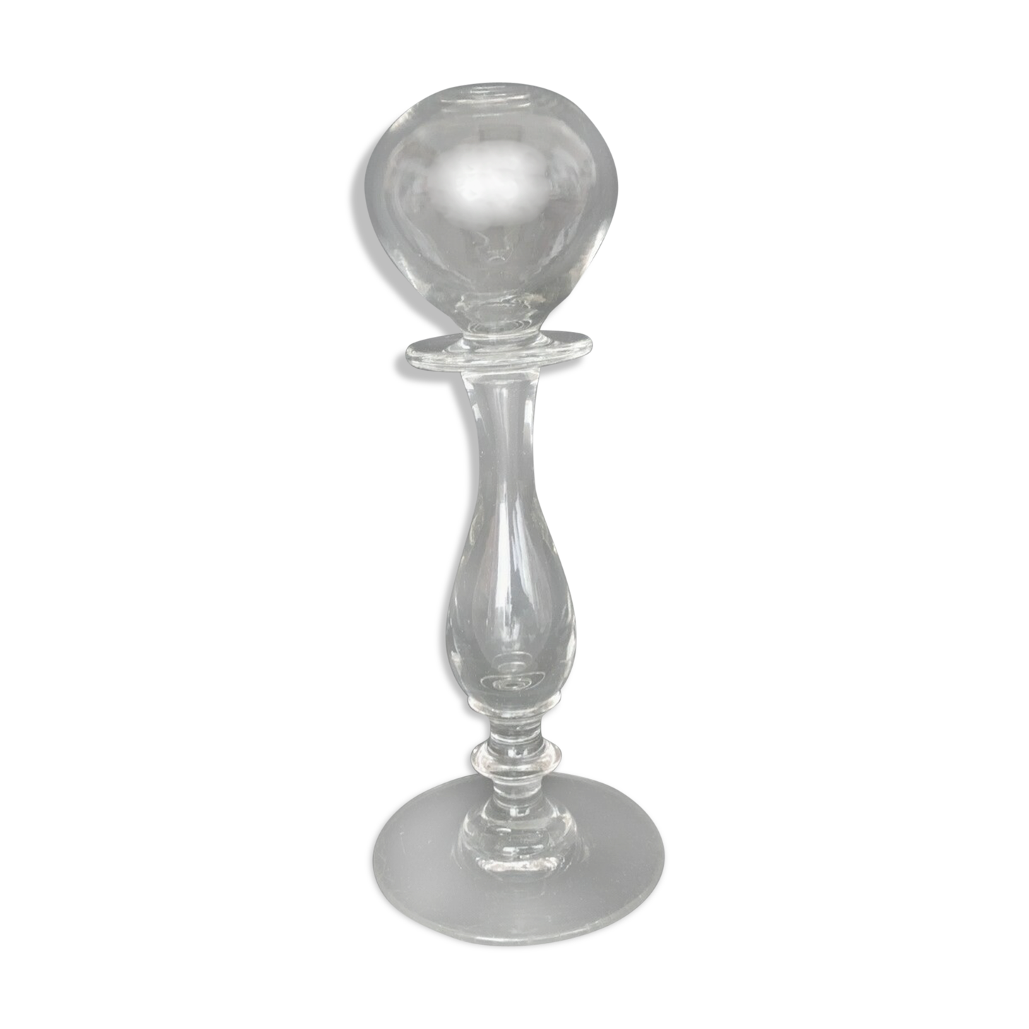 Glass oil lamp blows on foot shower