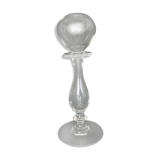 Glass oil lamp blows on foot shower