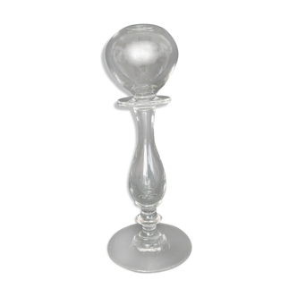 Glass oil lamp blows on foot shower