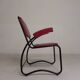 Set of 4 armchairs and a coffee table with tubular structure in Bauhaus style, 1950s.