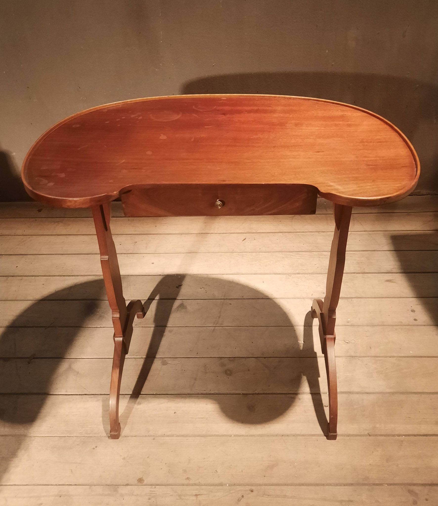 Kidney-shaped side table