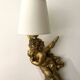 Pair of golden Puttis wall lights