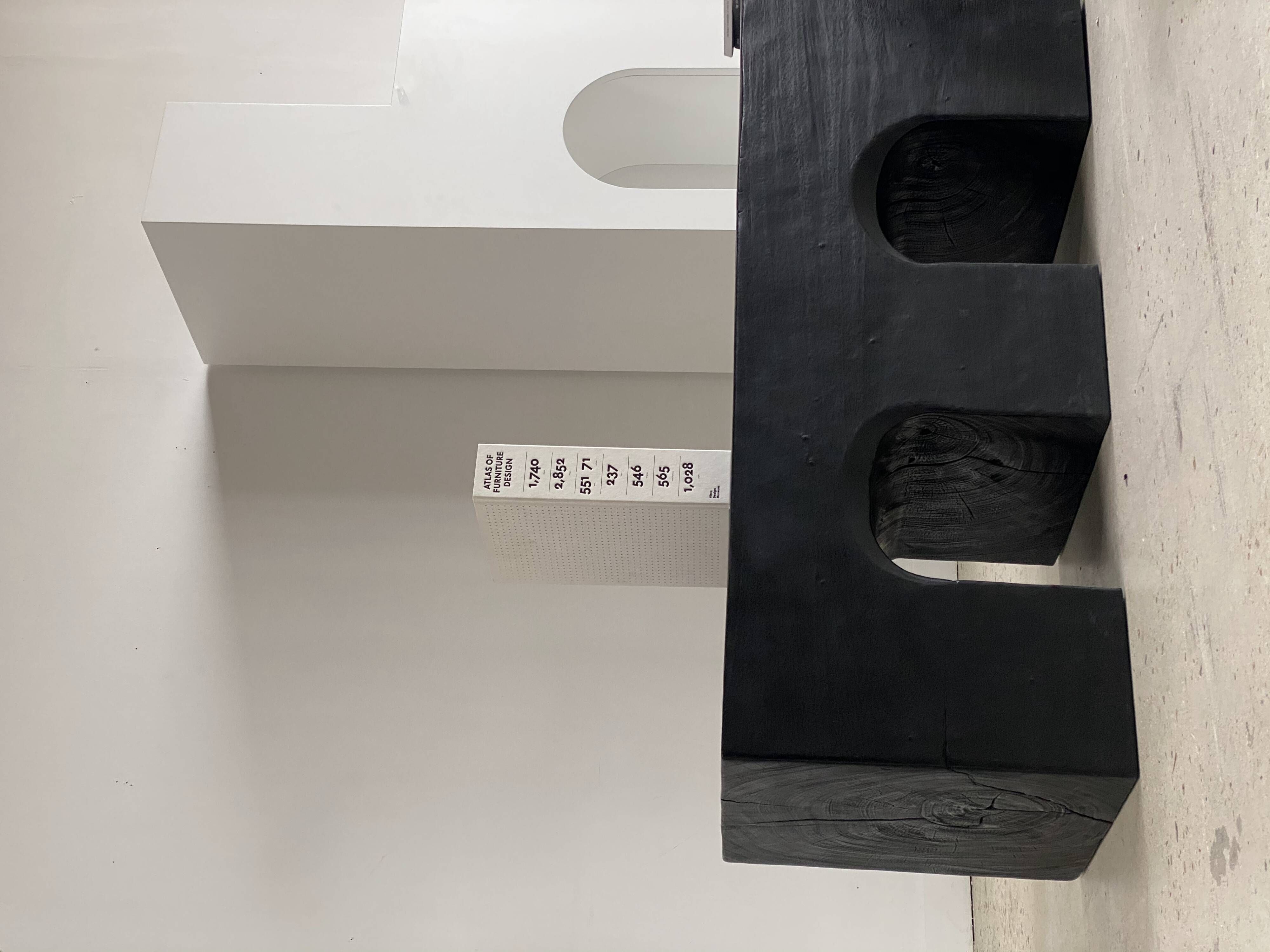 Bench in solid monoxyl wood, carved base in 3 arches - Black color