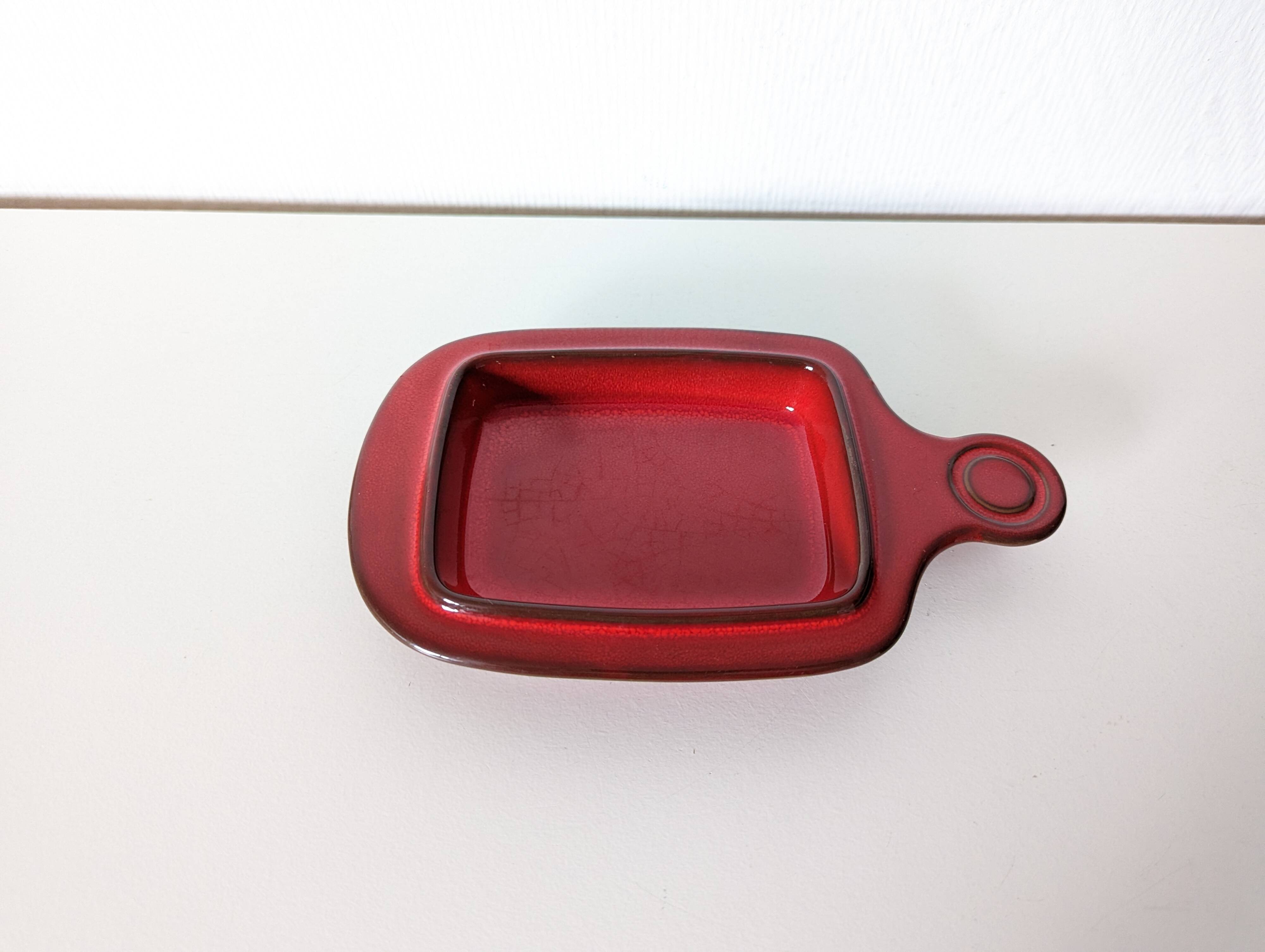 red glazed stoneware butter dish