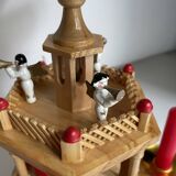 Pyramide carrousel de Noël en bois avec bougies