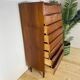 Mid-century Danish high chest of drawers with eight teak drawers.