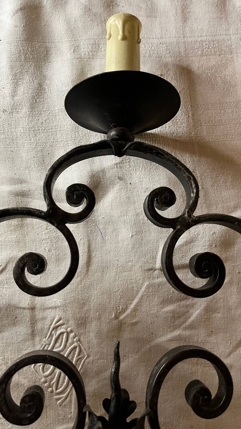 Pair of 3-light wrought iron candlesticks on vintage legs