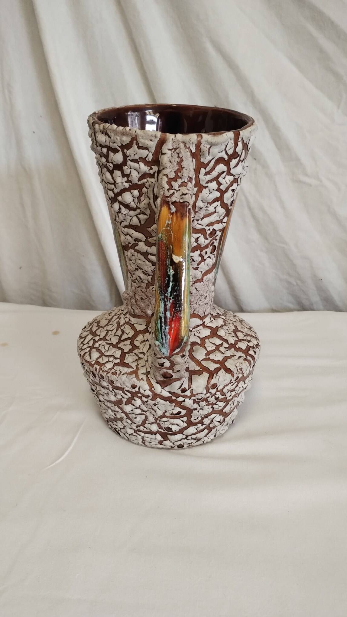 Cracked ceramic vase from the 70s