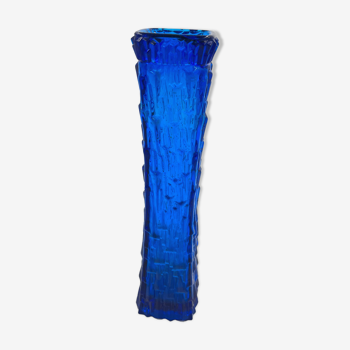 Blue glass vase with relief